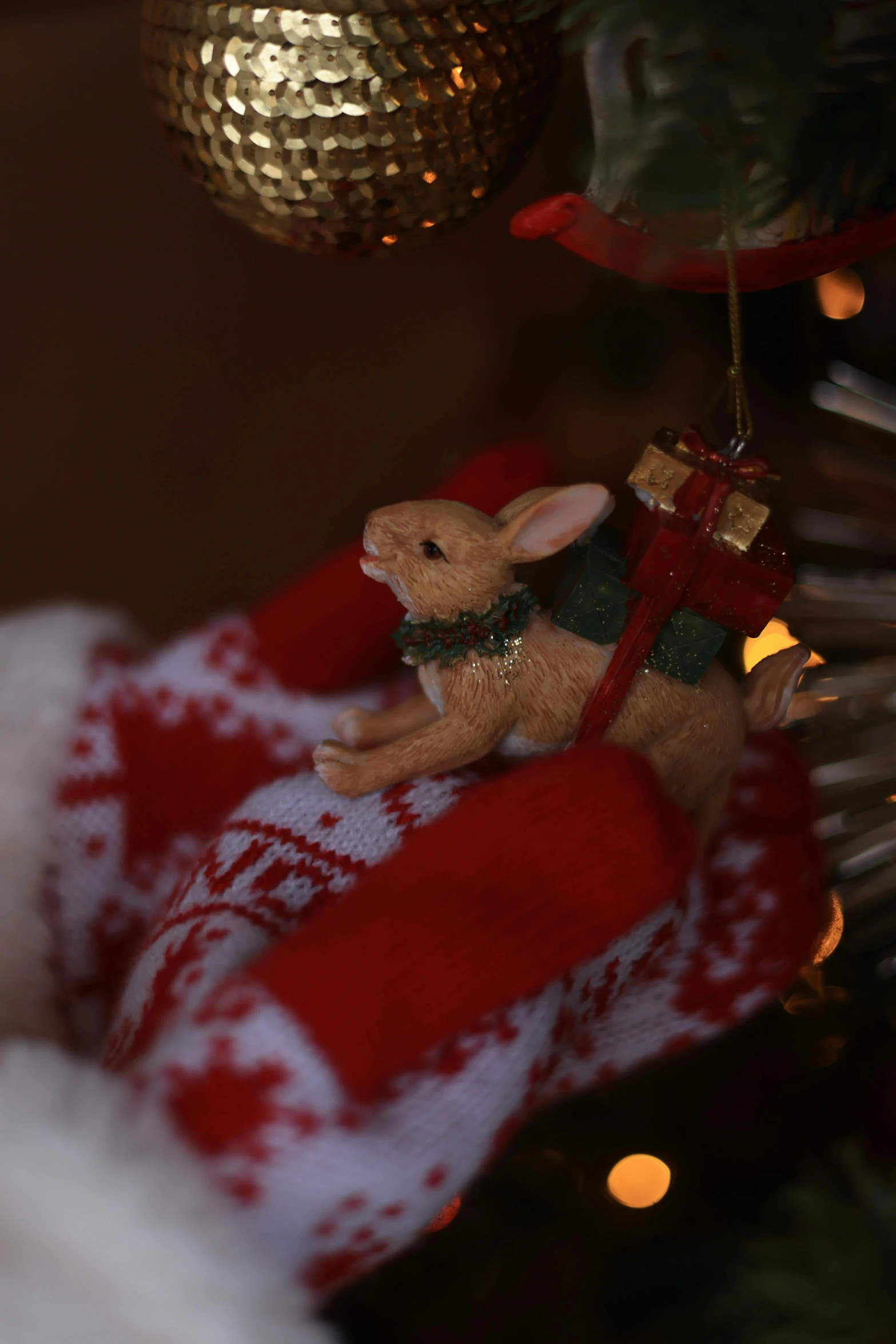 a christmas stocking and stuffed animal on a table