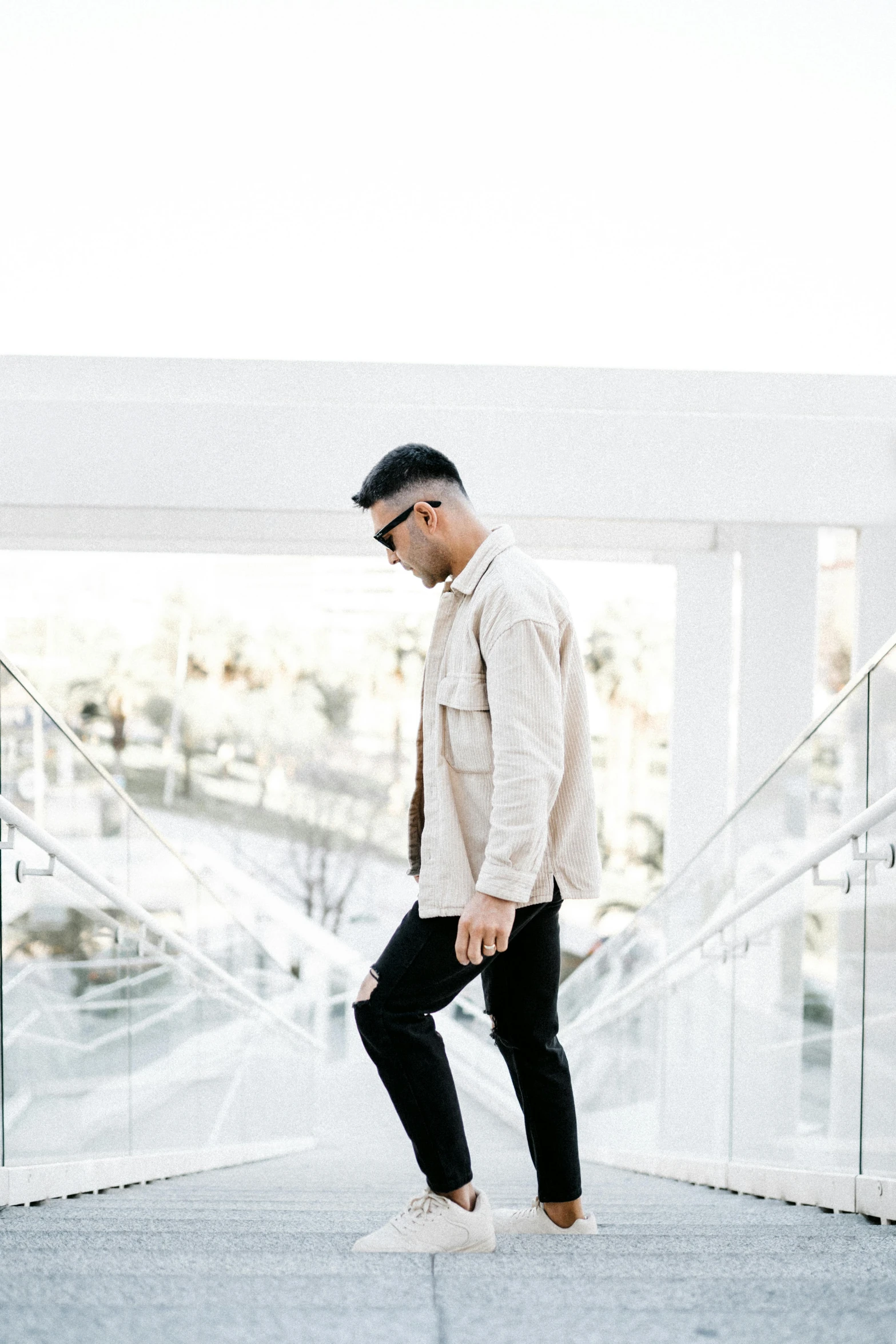 man walking in a white room