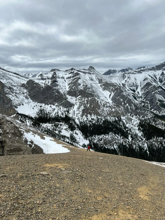 a person is standing on top of a mountain