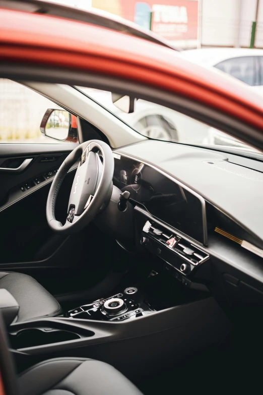 an interior of a car in traffic with cars