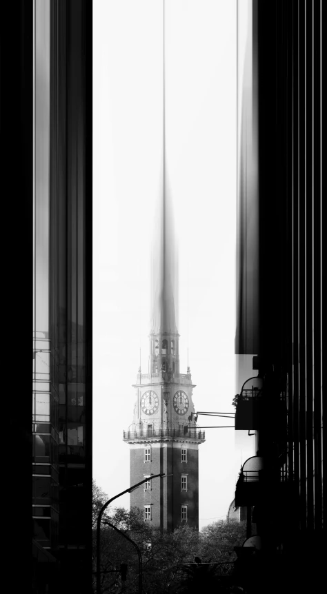 a black and white po of a clock tower