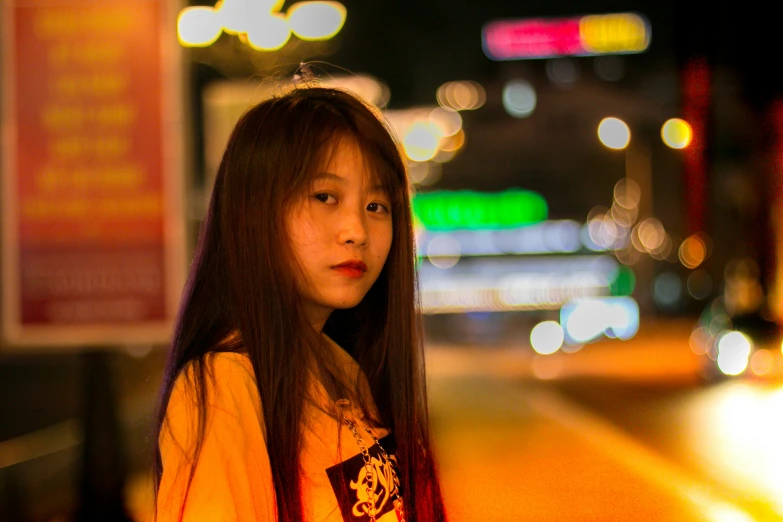 a girl standing in the middle of a street with her hair in a crown