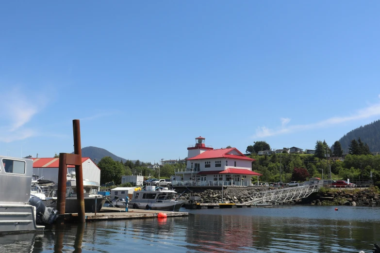 a house near the water with many boats