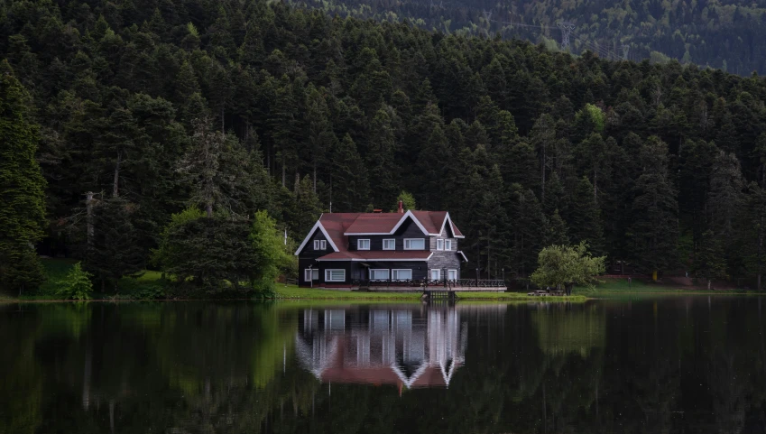 the building is located near the lake and has windows