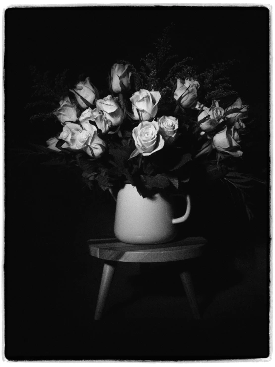 black and white pograph of a white flower arrangement