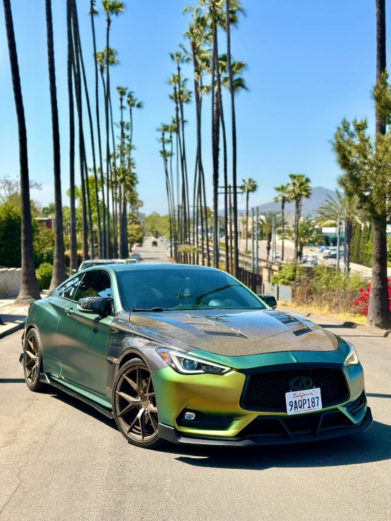 a shiny and chromed, sports car in a parking lot