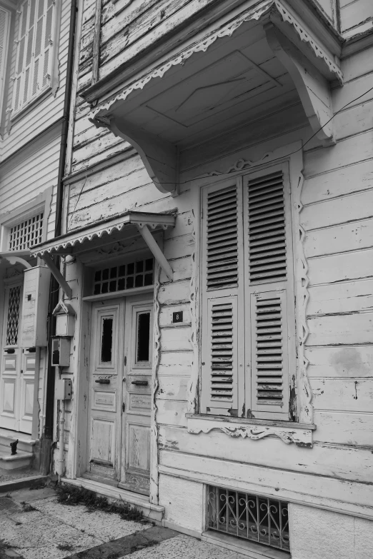 this is an old building with a cat