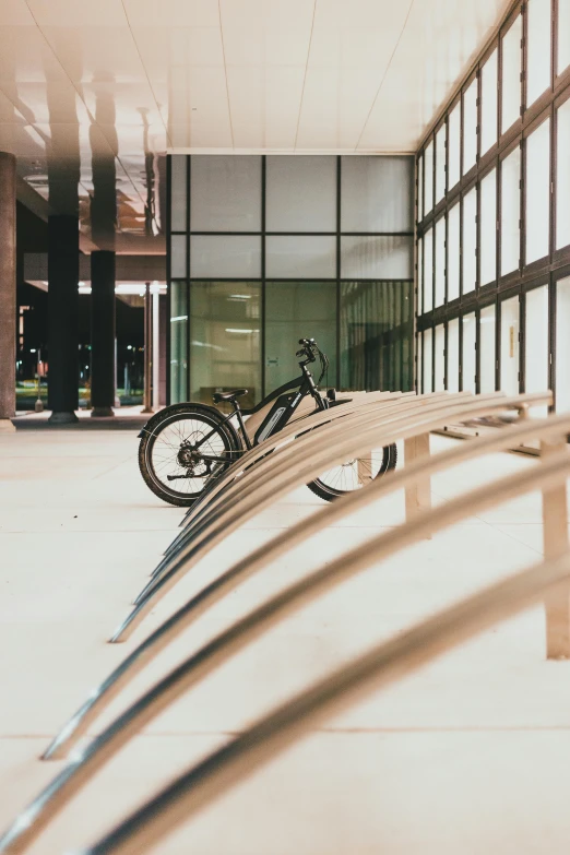 there is a bike sitting on top of benches