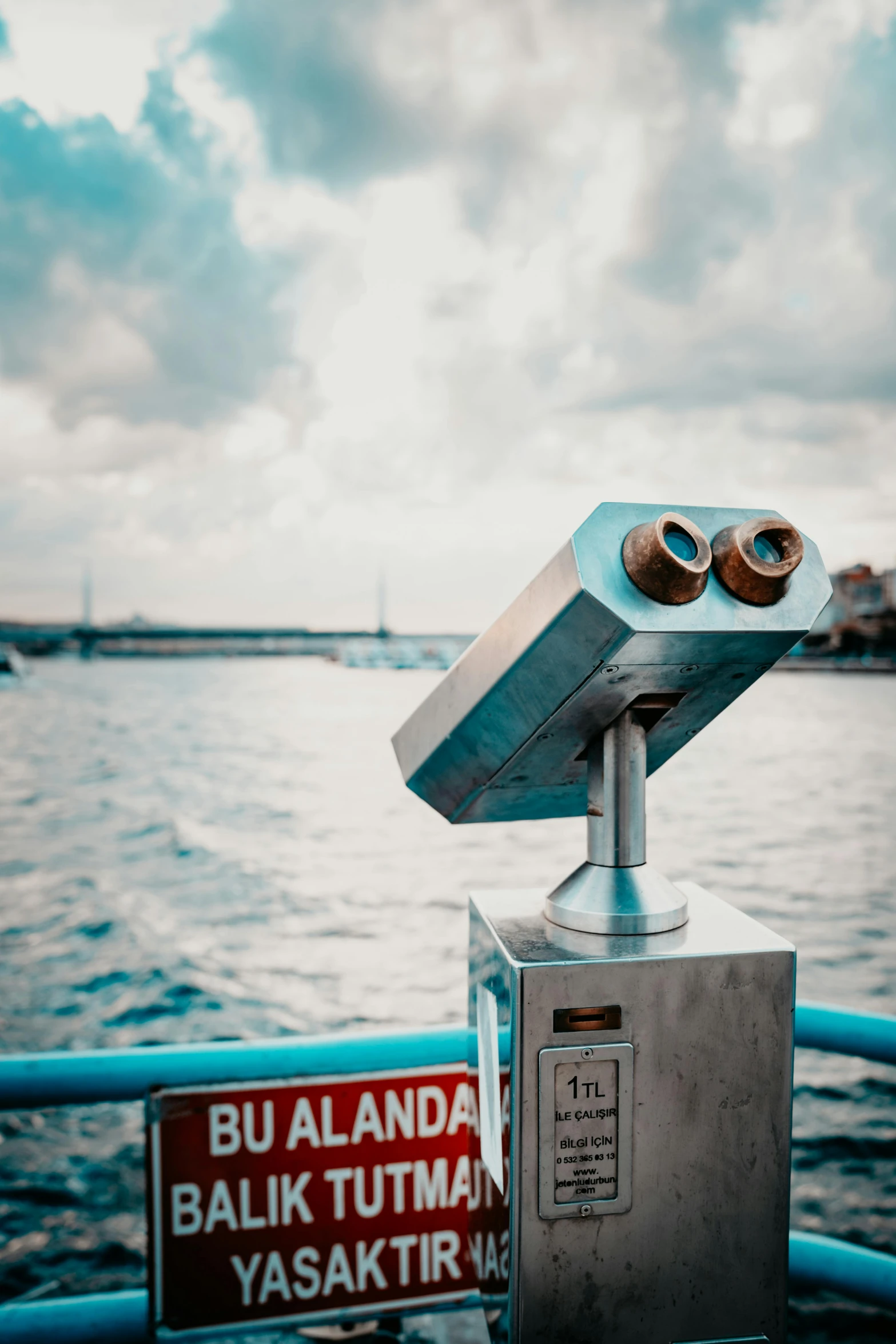 a po of binoculars in the middle of a body of water