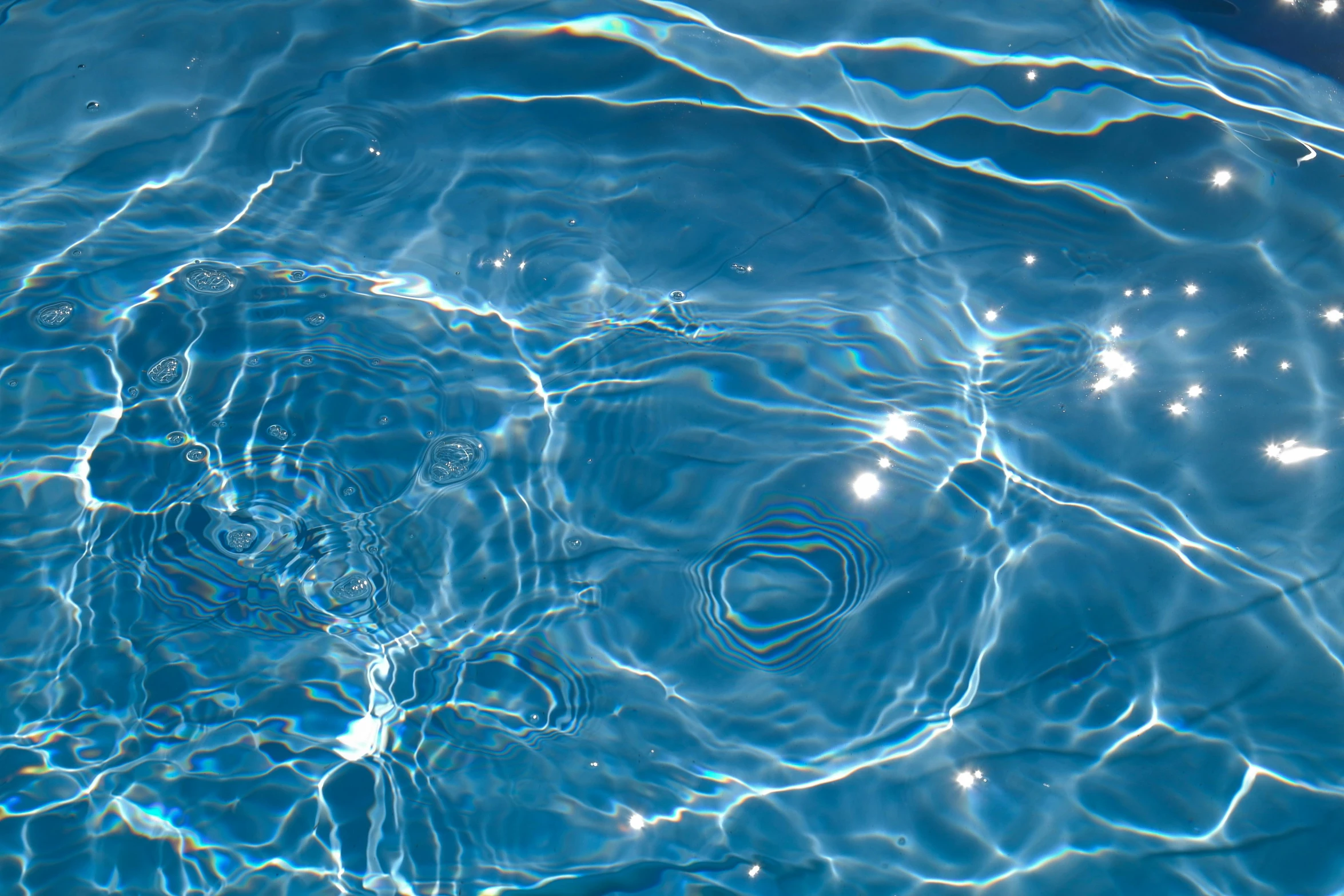 water is moving slowly in a swimming pool