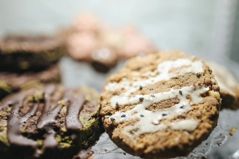 three cookies are sitting on a table together