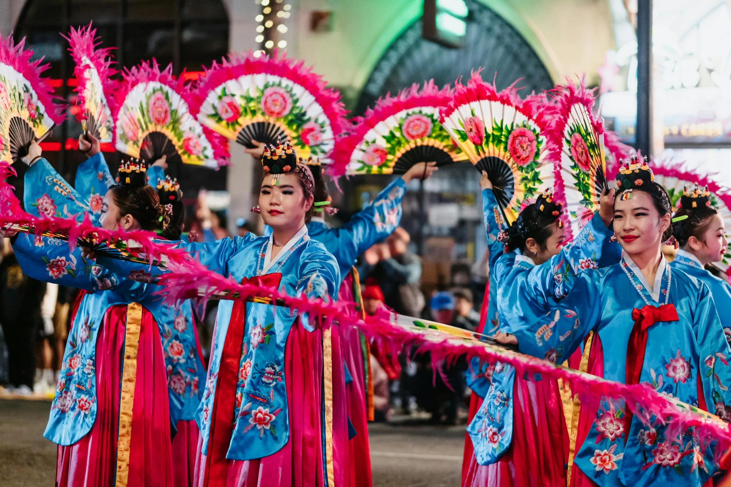 asian women dancing in front of the camera