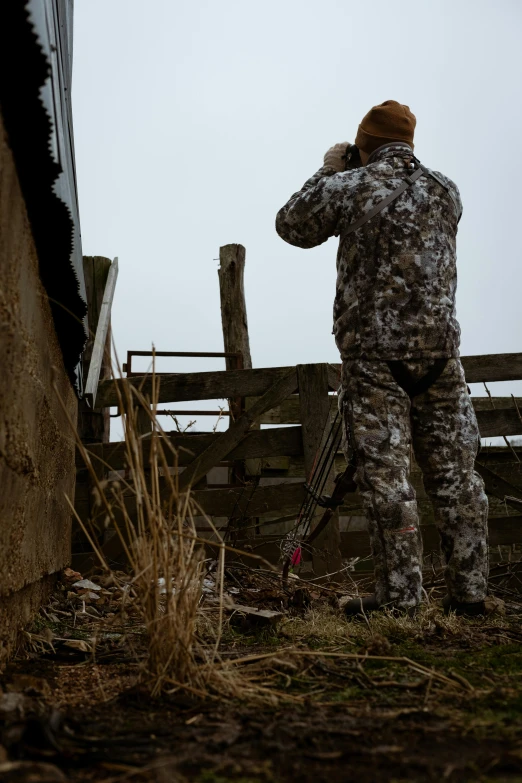 a soldier is taking a break at the farm