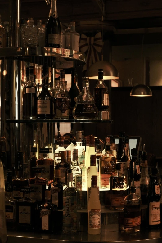 bottles and shelves of liquor on the counter