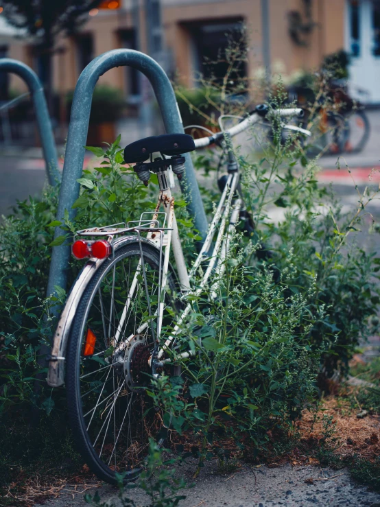 an image of a bicycle parked by the curb