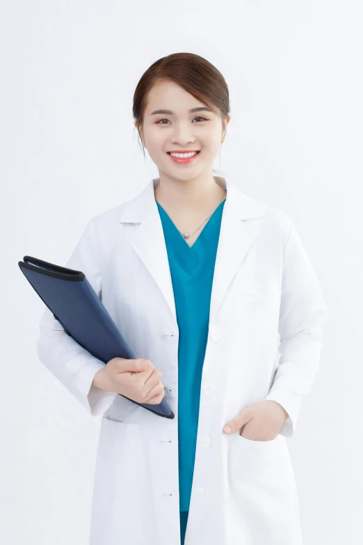 a woman in a lab coat is holding a clipboard