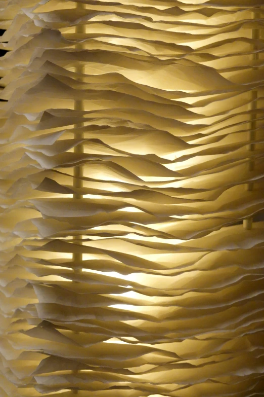 a background image of a light being generated from some paper