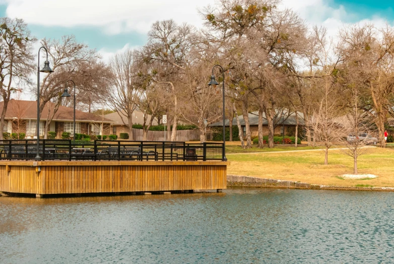 the dock is built on the side of a large body of water