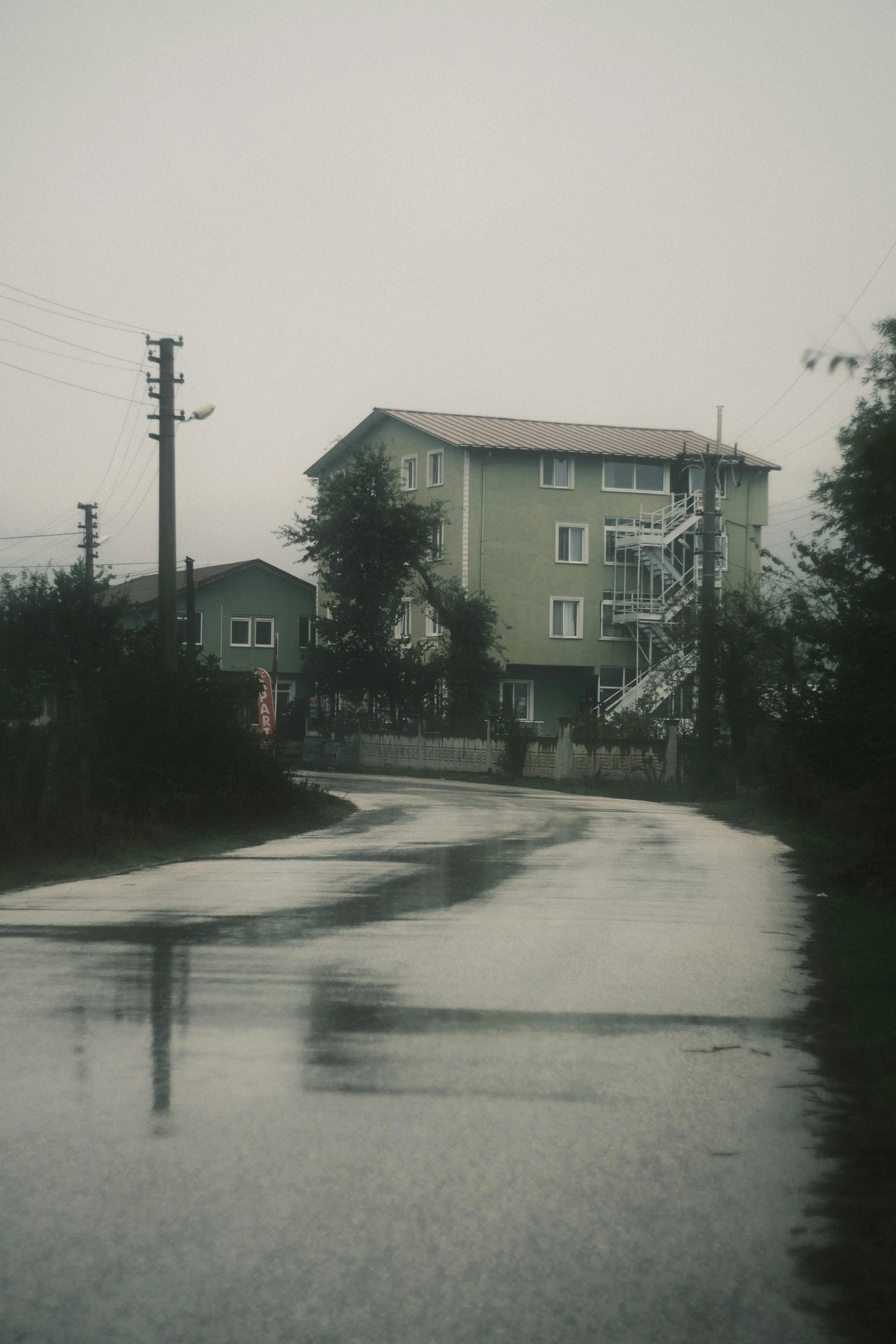 a street with a flooded road on it