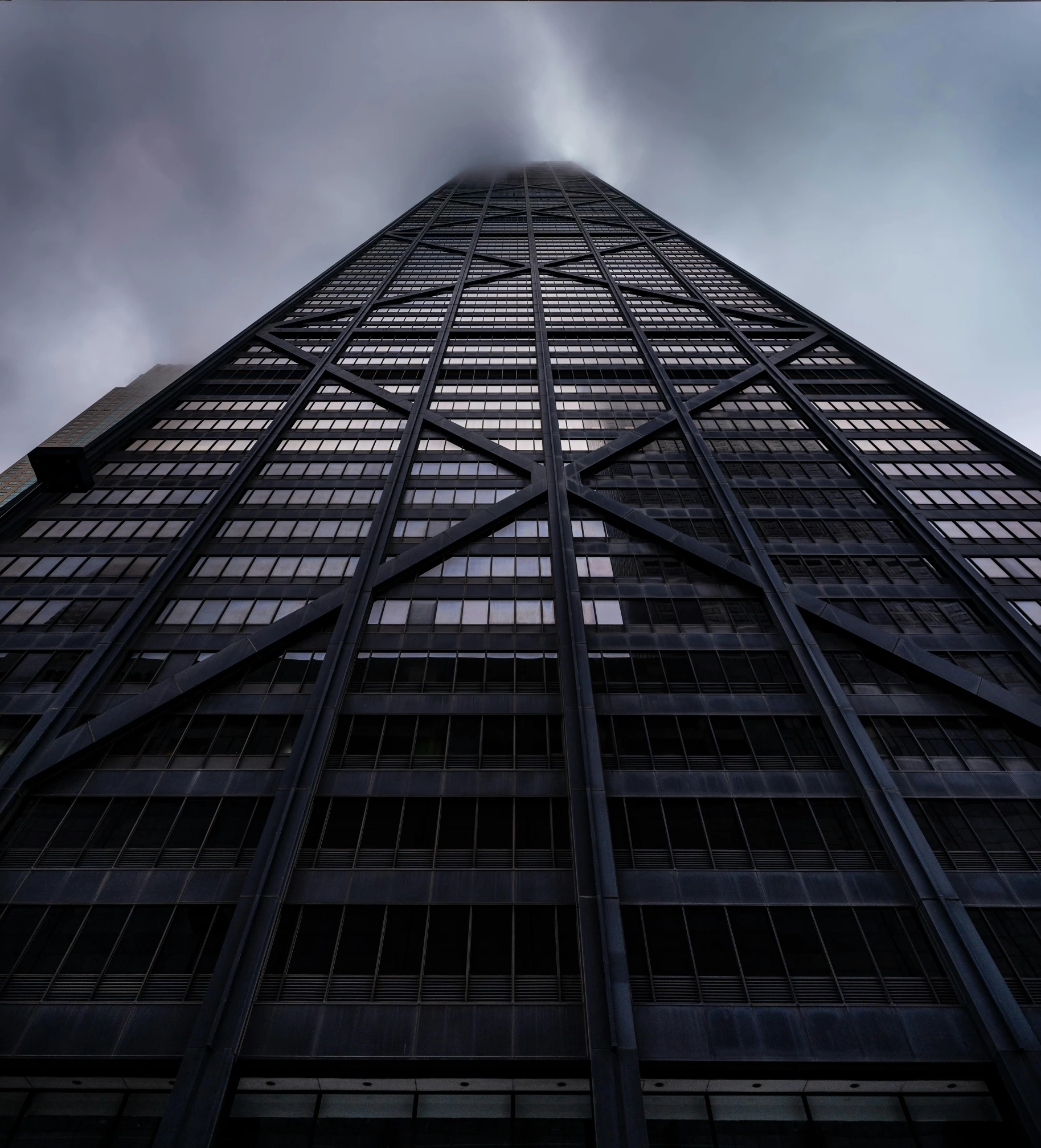 an upward view of the side of a building