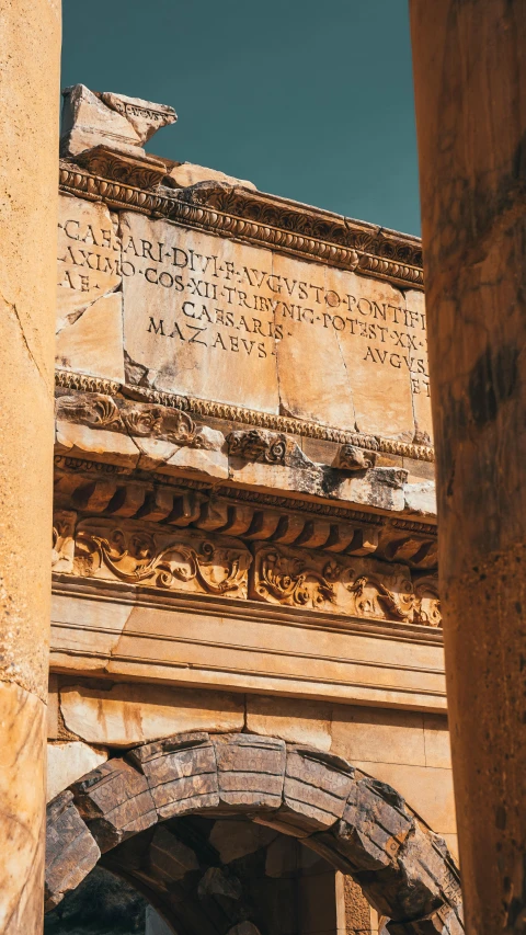 old ruins showing pillars with signs reading to be in disrepair