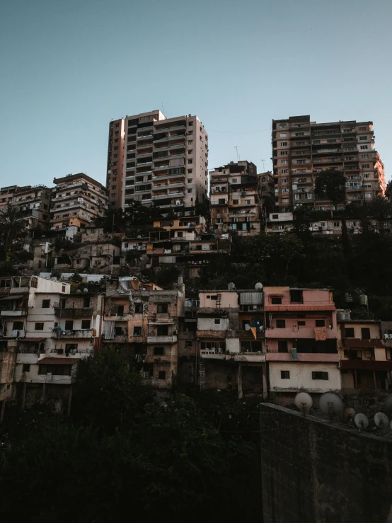 a hill is full of old homes on a clear day