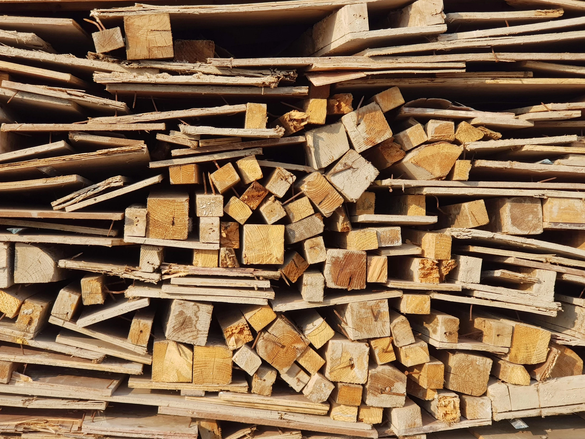 a pile of wood and pieces of wood