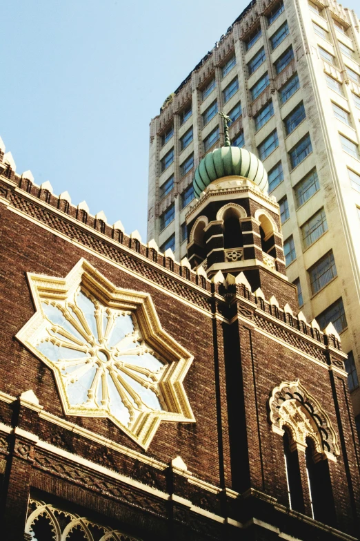 a brick wall with a clock on top of it