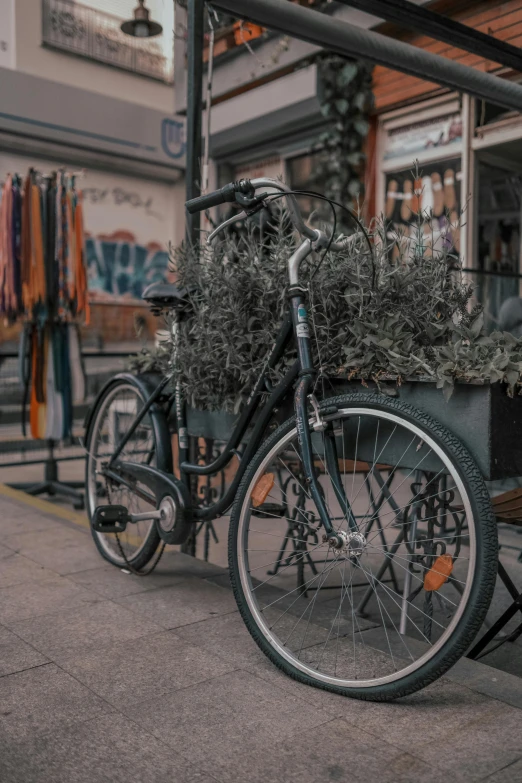 a bicycle that is parked next to a building