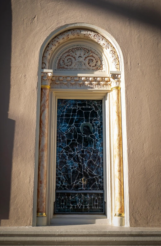 an old building has a stained glass window