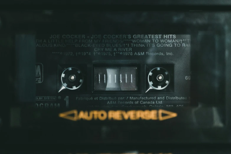 a close up of the word music on a radio