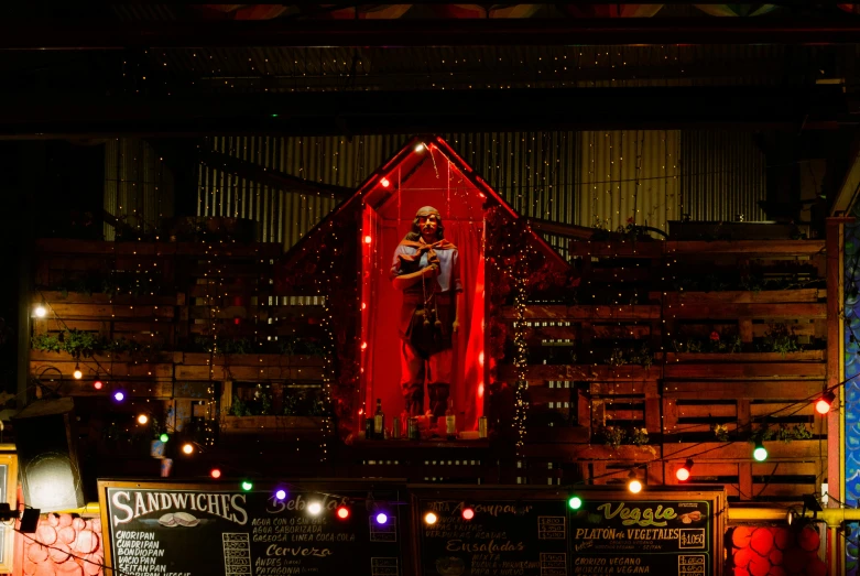 christmas lights adorn the roof of a restaurant