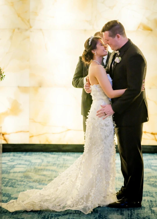 a man and woman emcing on the aisle