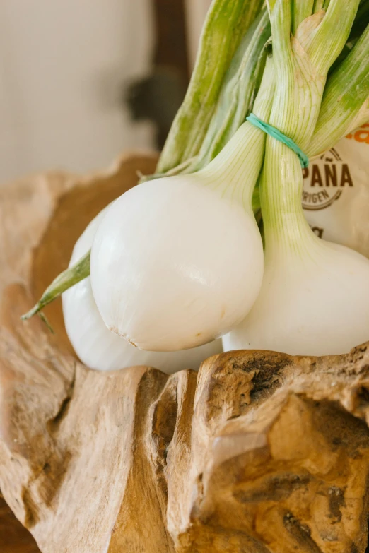 the onion is peeled on the table for prepping