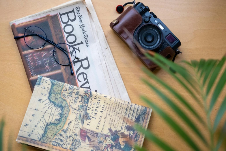 a po of the old map with a camera beside it