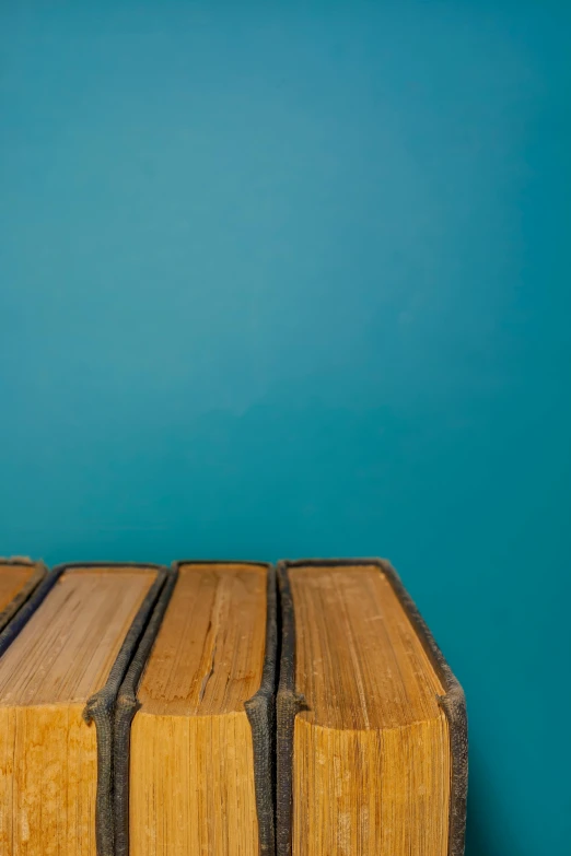 four wood pieces stacked next to each other on a table