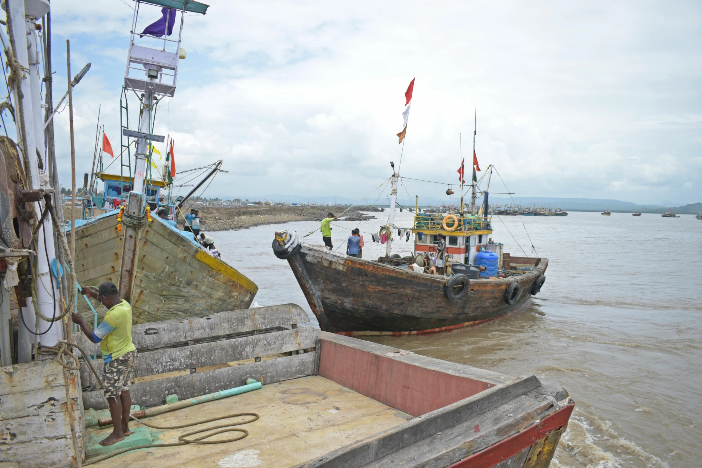 a number of boats in water near one another