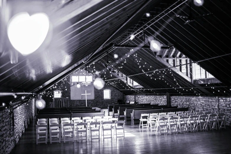 a very big room with a long table and chairs