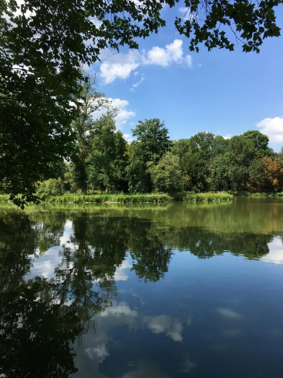 the lake is still calm with blue water