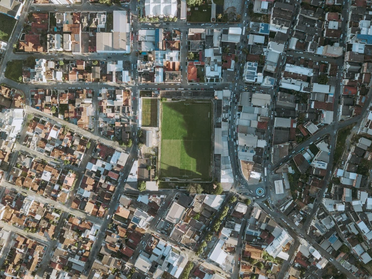 an aerial view of a city on a sunny day