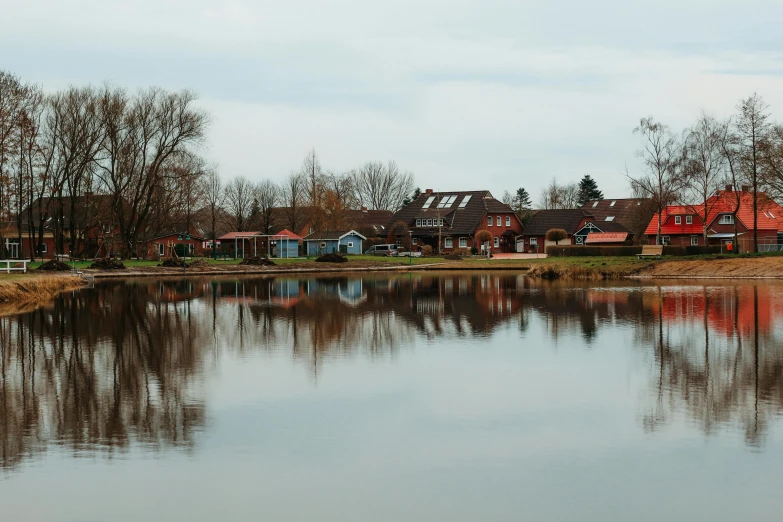 a large body of water with houses on each side