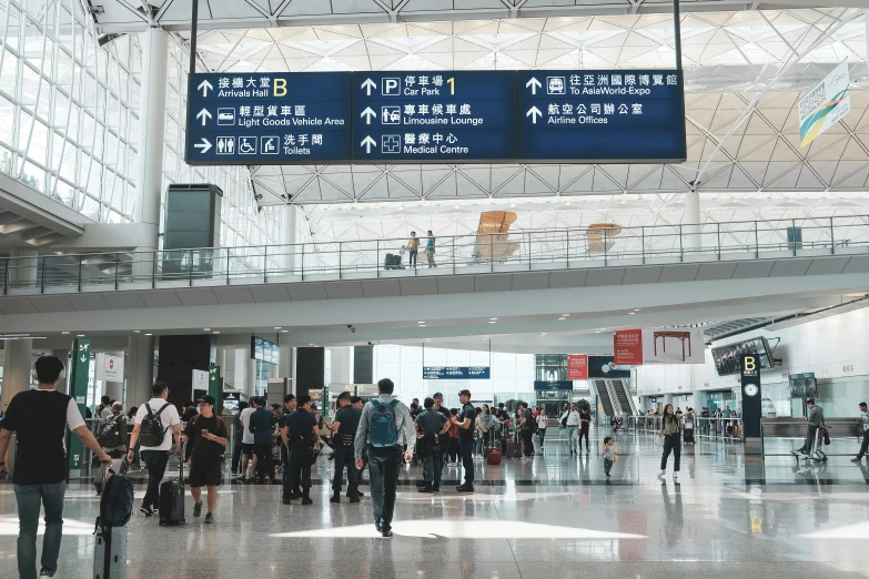 many people walk around at the airport