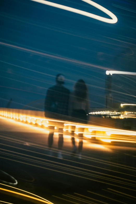 blurred night scene with blurry city lights and light beams