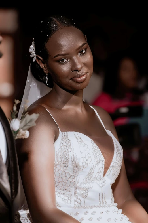 the bride and groom is standing next to each other