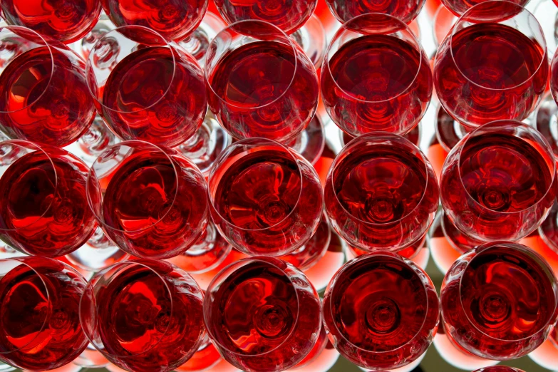 closeup of red glasses in front of a display in the store