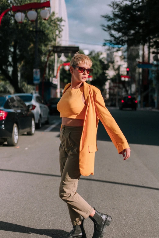 a woman is skateboarding on the street