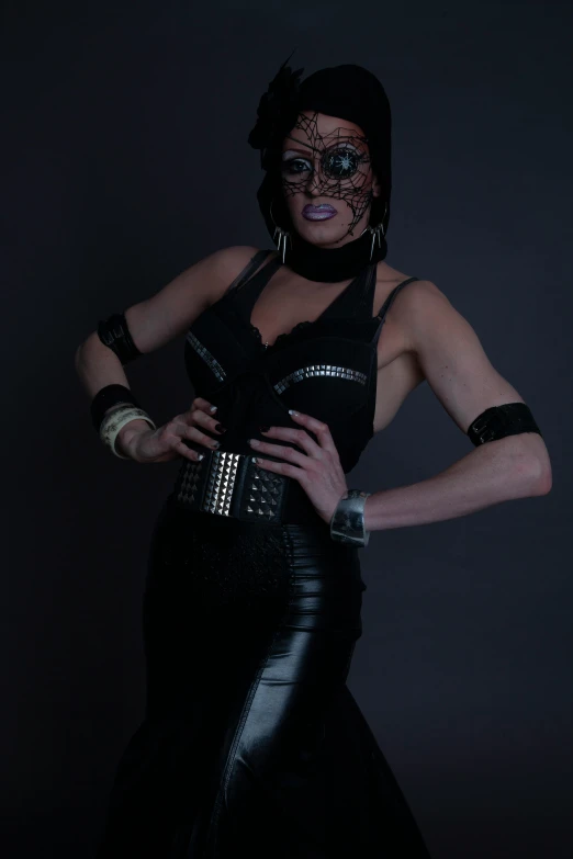 the woman wearing a costume with black paint