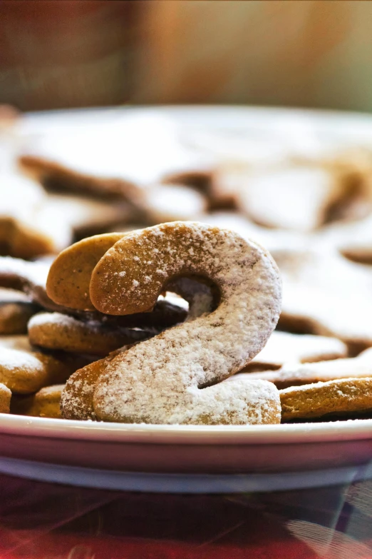 a plate of cookies with the number six on it