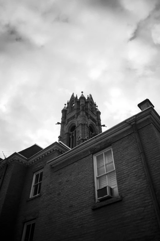 an old building with a clock at the top