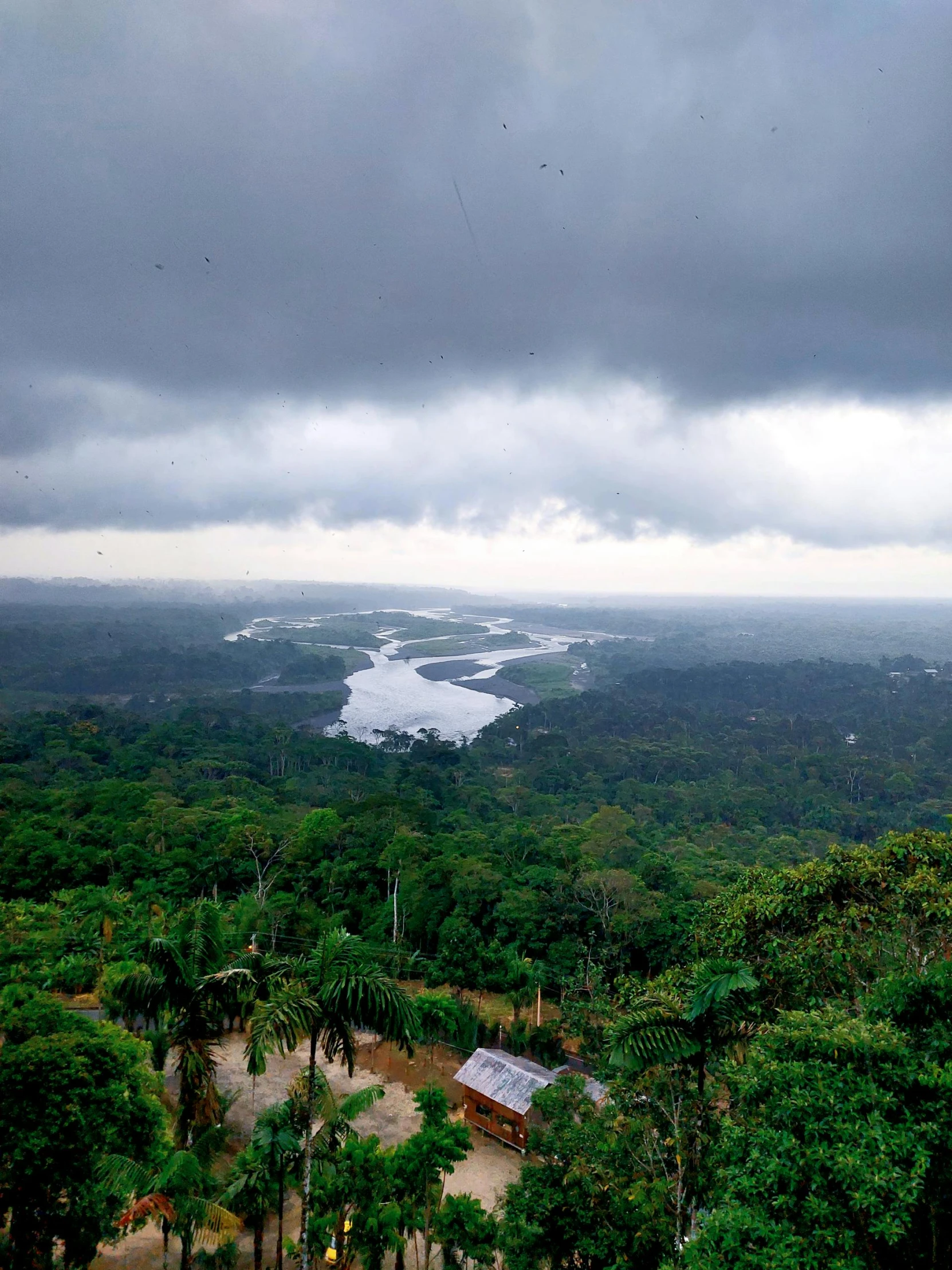 storm clouds over the jungle and waterway